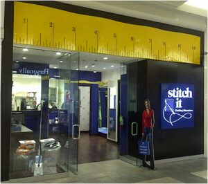 The exterior of Stitch It's Market Mall location.