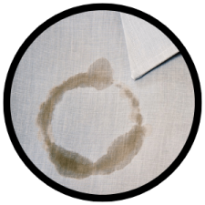 A photo showing a grease stain on a dress shirt.